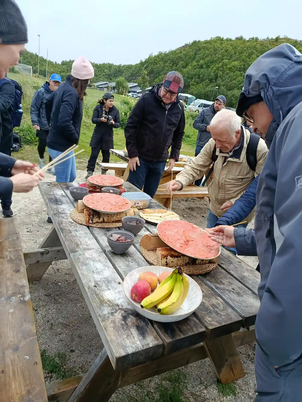 Guests helping themselves at the picnic table